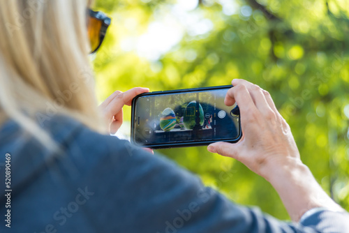 person taking a photo of a tourist destination in Mendoza Argentina
