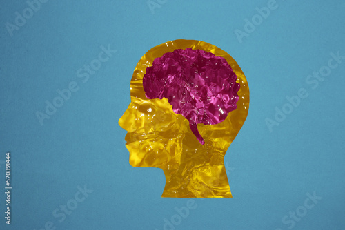 yellow water head with pink water brain, creative idea, blue background, futuristic look
