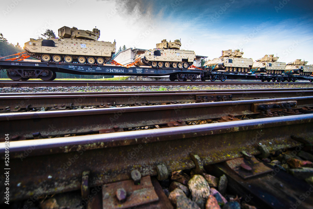 Fototapeta premium Pabrade/Lithuania October 21, 2019 US Army's 1st Armoured Battalion of the 9th Regiment, 1st Division from Fort Hood in Texas Bradley is unloaded as they arrive at the Pabrade railway station.