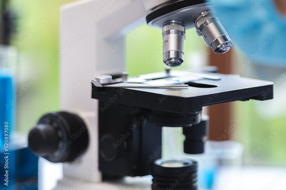 biotechnology scientist using scientific microscope for research in biology medicine laboratory, equipment for chemistry science or microbiology analysis in term of medical technology experiment biotechnology scientist using scientific microscope for research in biology medicine laboratory, equipment for chemistry science or microbiology analysis in term of medical technology experiment