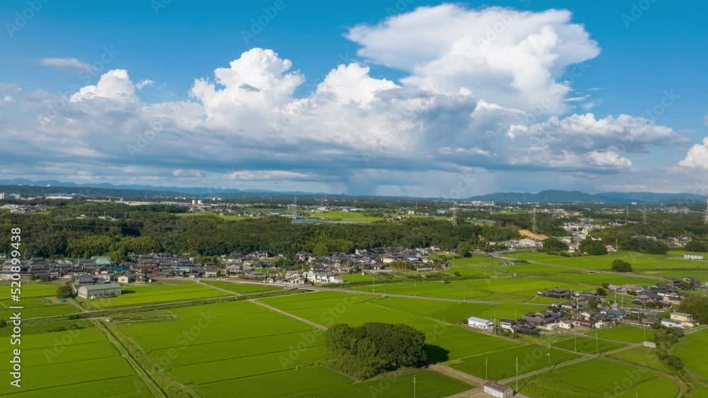 Hyperlapse: Fluffy clouds form over idyllic countryside on sunny day Hyperlapse: Fluffy clouds form over idyllic countryside on sunny day