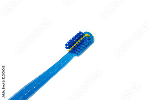 Special toothbrush for clean teeth and braces, close-up. Toothbrush with bracket groove cleaning the outer surfaces of brackets and wires. White background, copy space. Design element