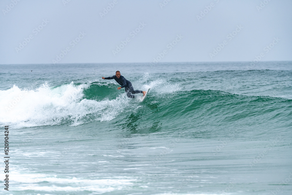 Surfer riding a wave