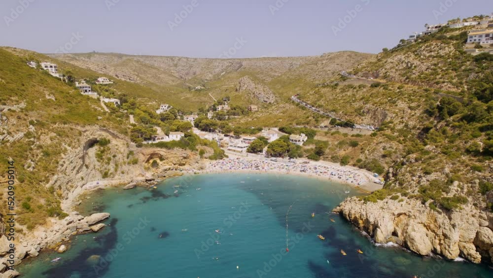 La Granadella beach in Javea, Spain, on a sunny day La Granadella beach in Javea, Spain, on a sunny day