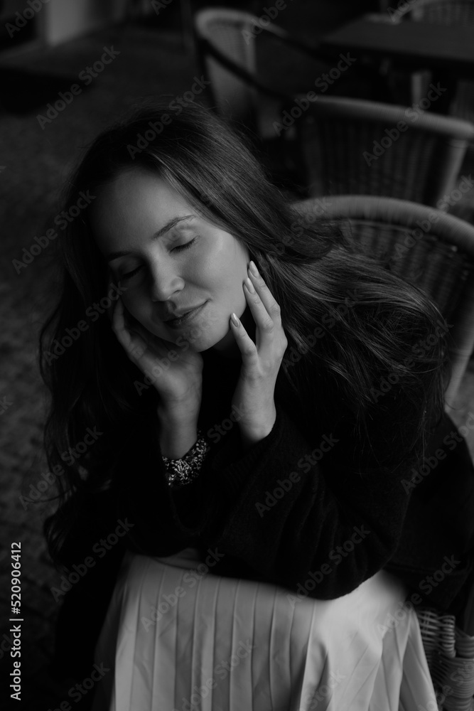 Sensual portrait of a young happy brunette 