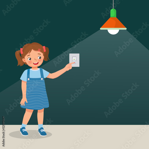 cute little girl turn on or switch on the light 
