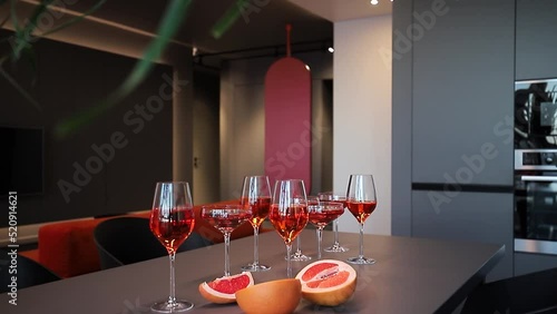 Red alcoholic drinks in glasses on the table