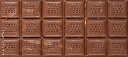 bar of natural milk chocolate divided into equal squares