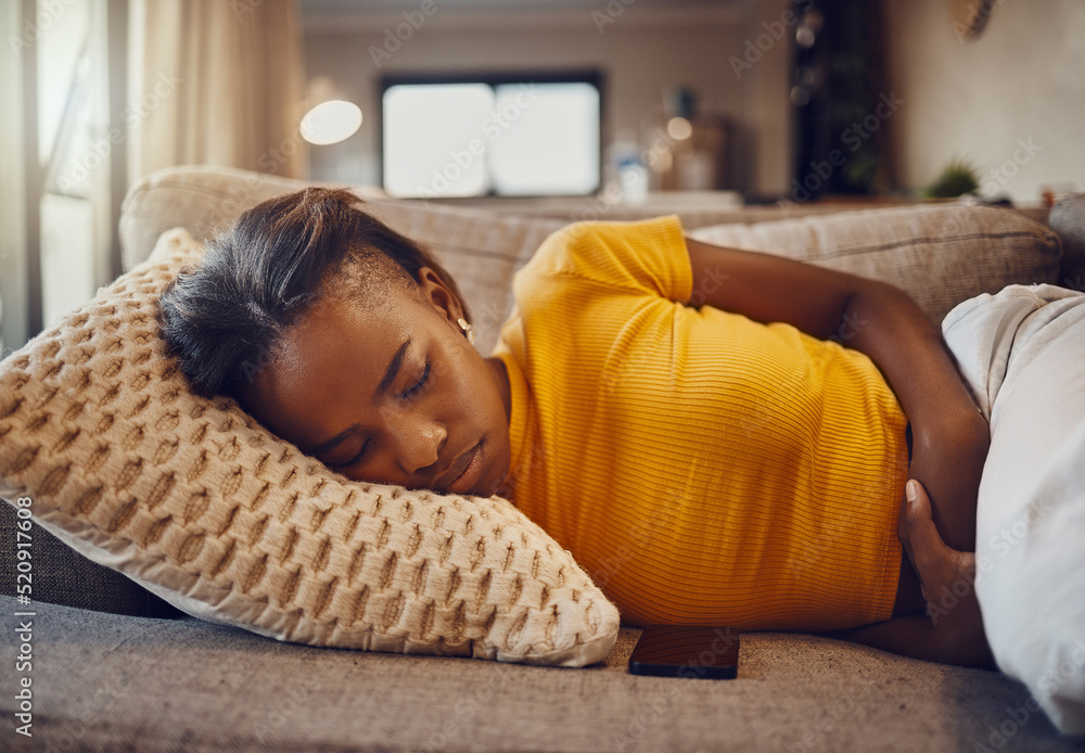 Stomach pain, illness and sickness causing a tired, young and sleepy