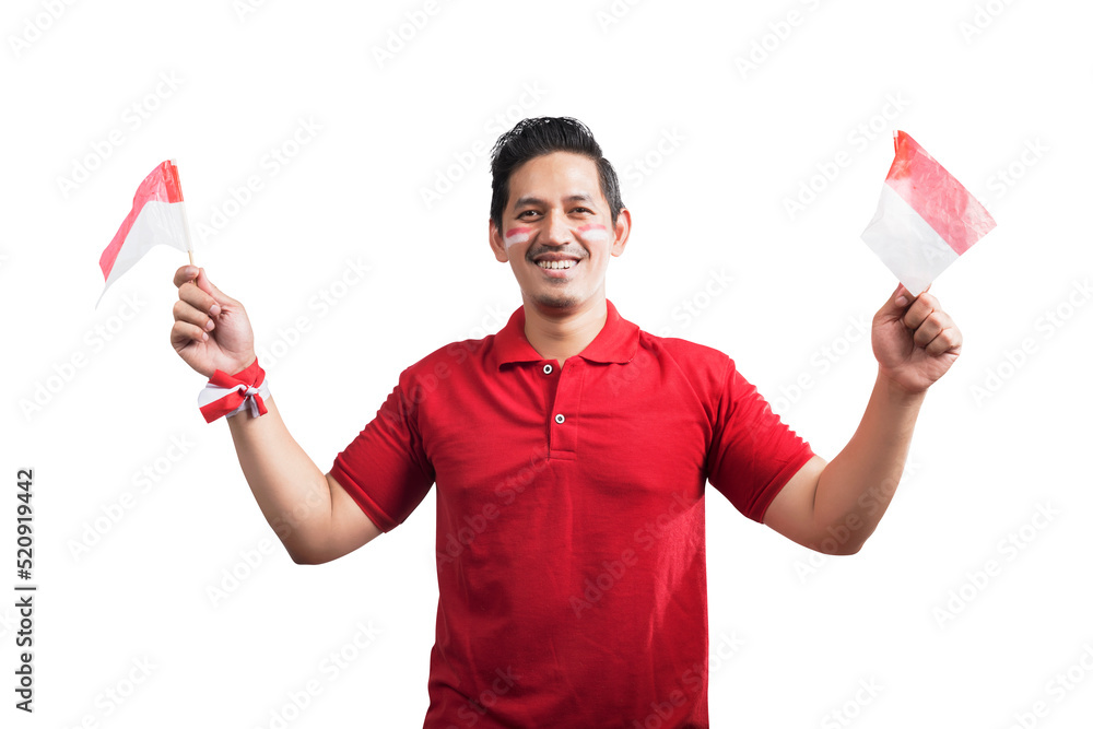 Indonesian men celebrate Indonesian independence day on 17 August by holding the Indonesian flag Indonesian men celebrate Indonesian independence day on 17 August by holding the Indonesian flag