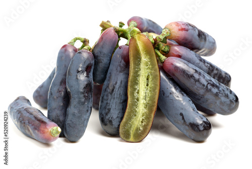 Raw Organic Long Purple Grapes on white background