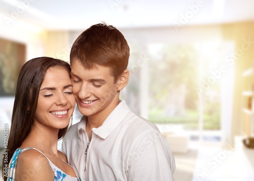 Happy young couple posing together