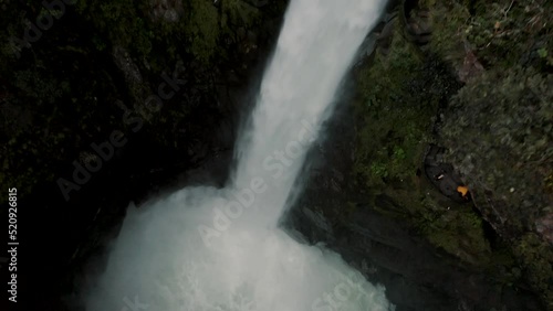 Impressive Scenery Of The Pailon del Diablo Waterfall (Devil's Cauldron) In The Province Of Tungurahua Near Baños Ecuador. aerial drone ascend