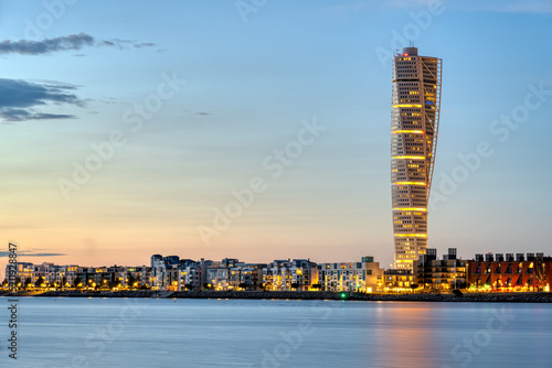 The Turning Torso in in Malmö, Sweden, at dusk photo