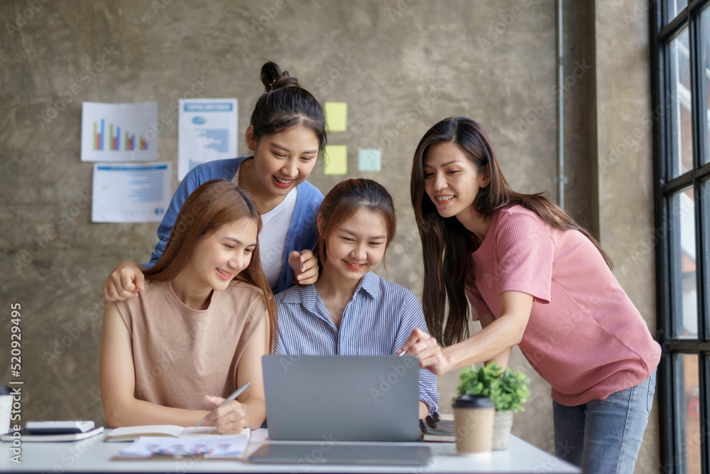 Charming and creative young Asian businesswomen meeting to plan a meeting together marketing strategies, sales strategies to expand the business. Charming and creative young Asian businesswomen meeting to plan a meeting together marketing strategies, sales strategies to expand the business.