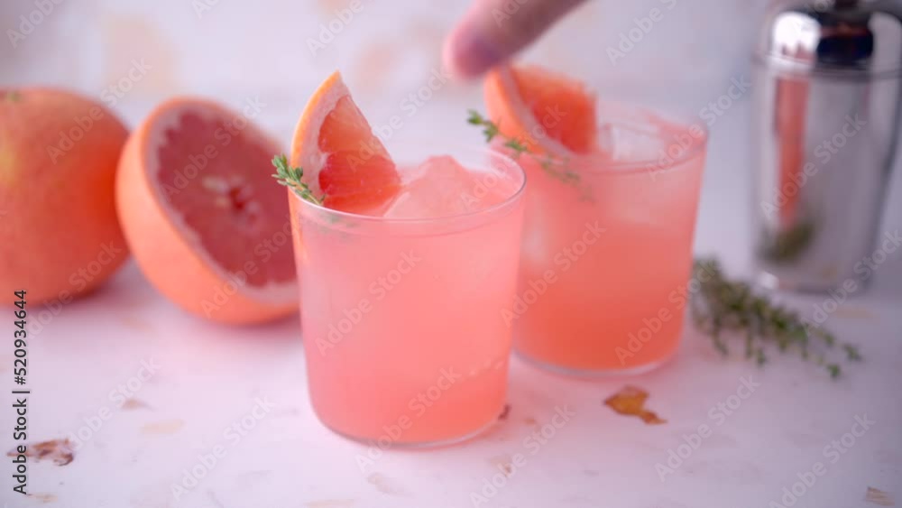 pink cocktail with grapefruit and thyme pink cocktail with grapefruit and thyme