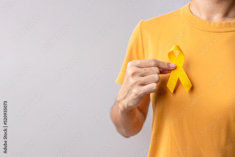 Yellow September, Suicide prevention day, Childhood, Sarcoma, bone and bladder cancer Awareness month, Yellow Ribbon for supporting people life and illness. Healthcare and World cancer day concept - obrazy, fototapety, plakaty 