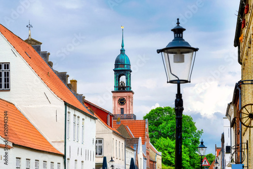 Historic houses in the idyllic old town of Friedrichstadt, Germany photo