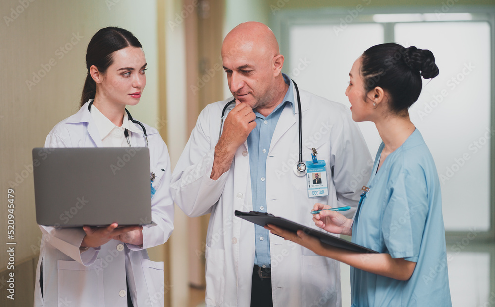 Medical personnel stand at a doctor's meeting, give advice, nurses and assistants, hospital personnel, professionalism