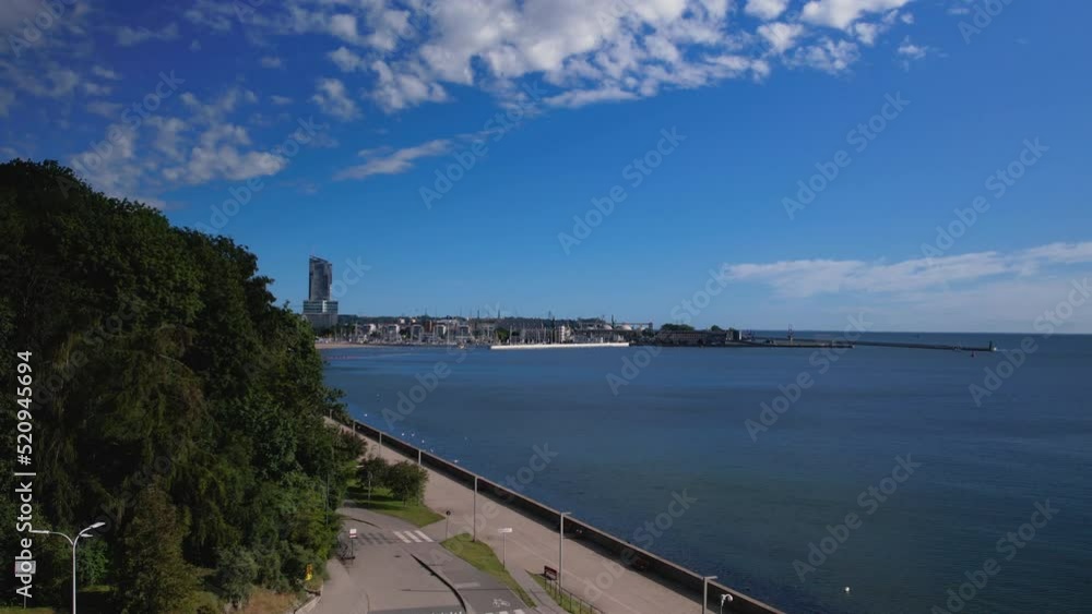Beautiful Scenery At Seaside Boulevard With City Buildings View In The Background, Gdynia, Poland. - Drone Shot Beautiful Scenery At Seaside Boulevard With City Buildings View In The Background, Gdynia, Poland. - Drone Shot