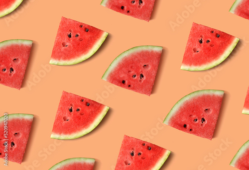 Texture of watermelon slices on an orange background