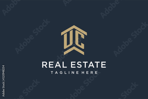 Initial UC logo for real estate with simple and creative house roof icon logo design ideas