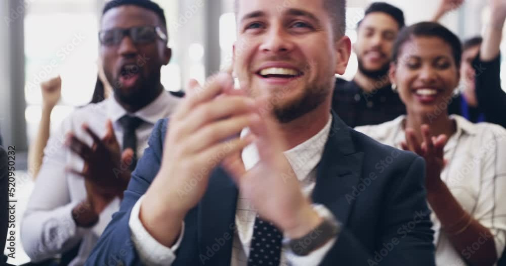 Cheering and excited colleagues clapping for success in a presentation as a group or team in a conference meeting where training is the focus. Happy coworkers celebrating during a workshop or seminar