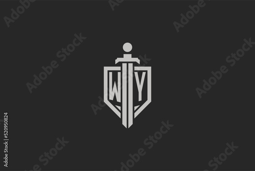 Letter WY logo with shield and sword icon design in geometric style