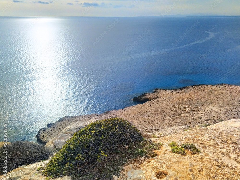 Summer sunny marine landscape. Beautiful sea view from the high cliffs. Cyprus, Mediterranean Sea coast.