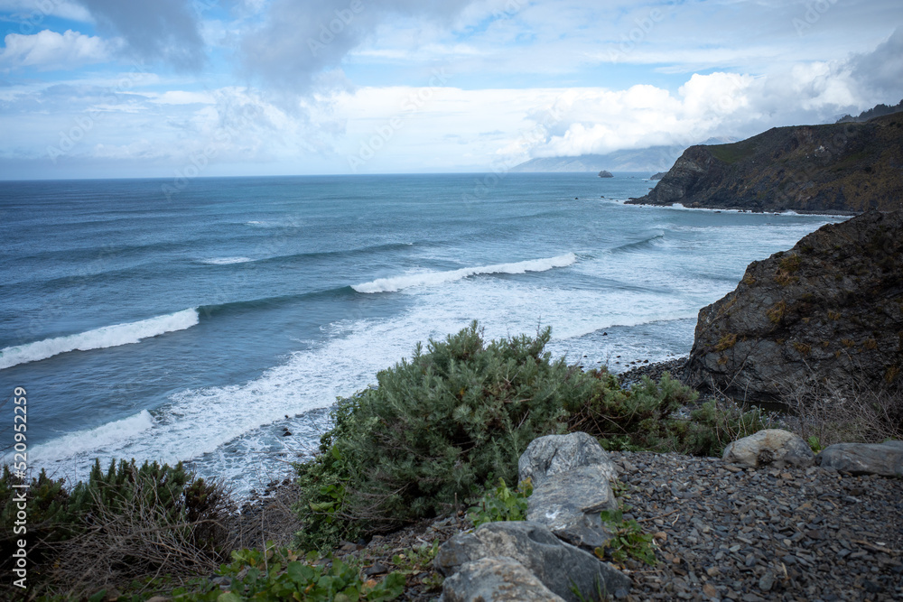 waves crashing on rocks near Highway 1 in California waves crashing on rocks near Highway 1 in California