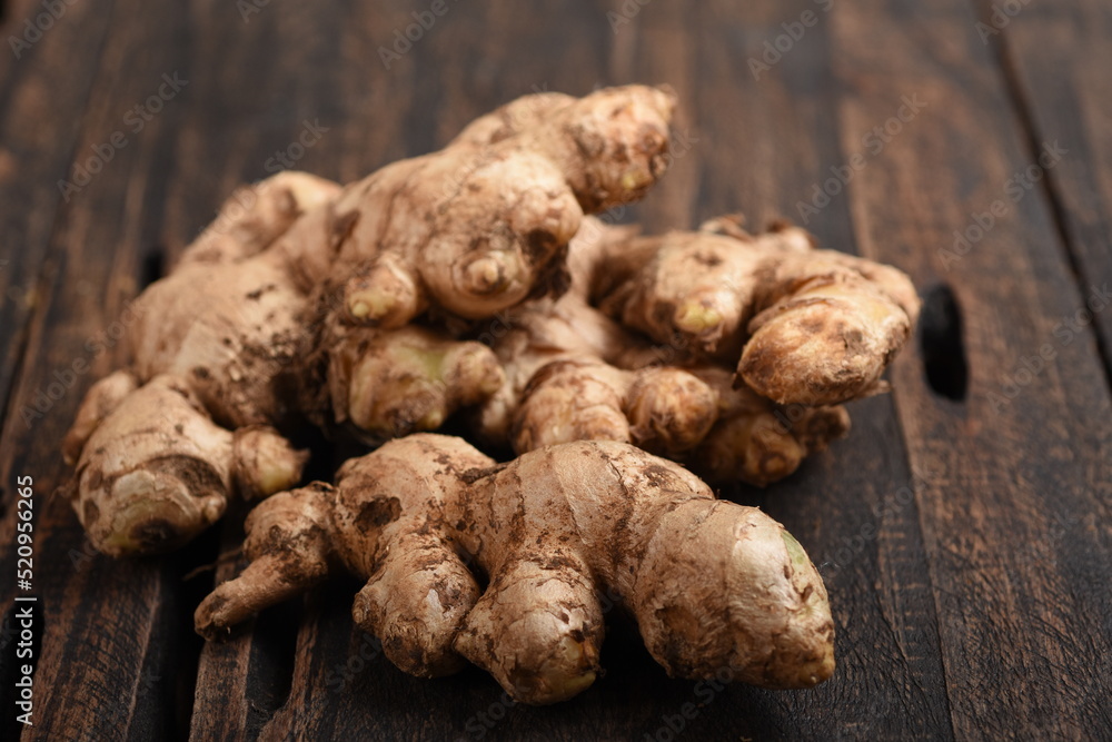 ginger root on wooden table