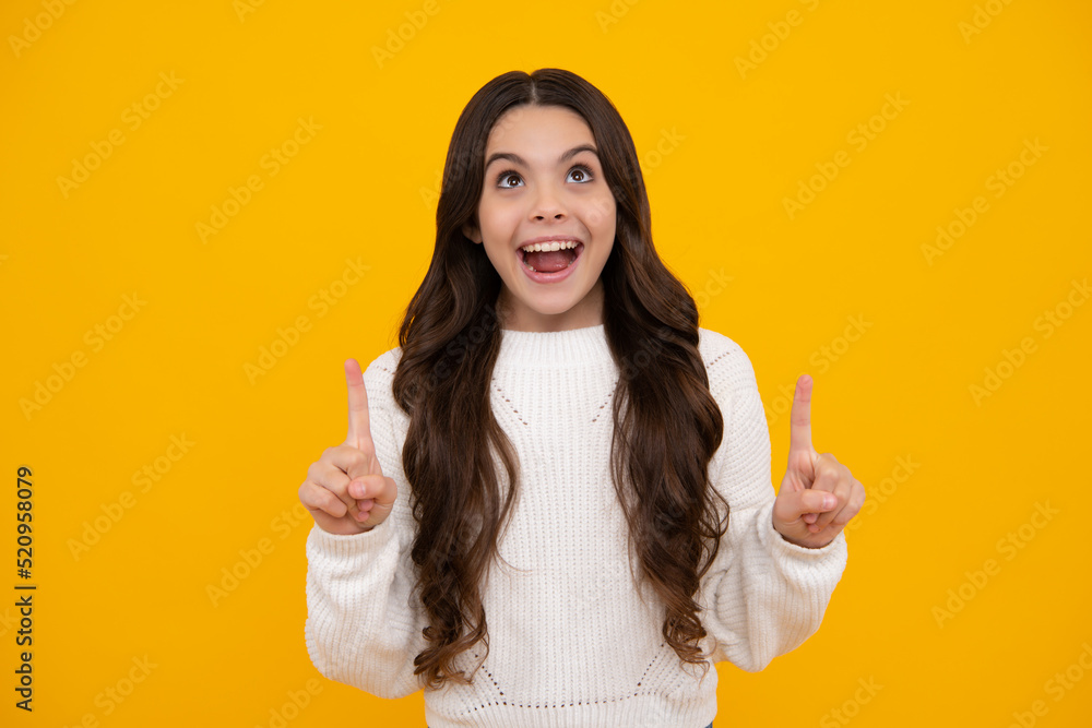 Excited teenager girl. Impressed teenage girl showing recommendation copyspace. Child teenager points away, pointing aside at copy space. Excited teenager girl. Impressed teenage girl showing recommendation copyspace. Child teenager points away, pointing aside at copy space.