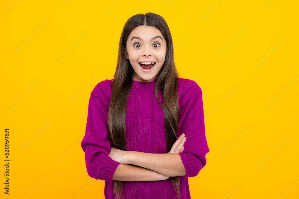 Shocked teenager child with amazed look on yellow background, amazement. Excited kids face. Amazed expression, cheerful and glad.