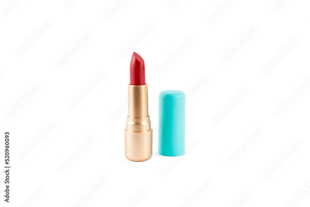 Red lipstick in a golden tube isolated on a white background. Cosmetic product for bright beauty creative makeup. Make-up artist tool.. Red lipstick in a golden tube isolated on a white background. Cosmetic product for bright beauty creative makeup. Make-up artist tool..