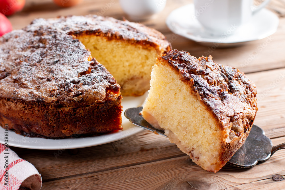 Apple pie, sponge cake, Charlotte with apples on a table Apple pie, sponge cake, Charlotte with apples on a table