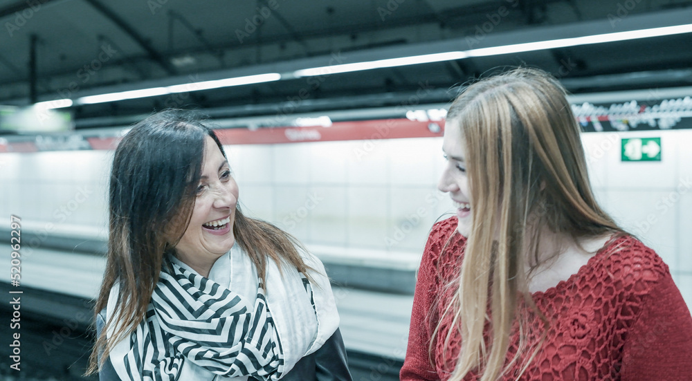 custom made wallpaper toronto digitalCouple of female friends talking in the subway station