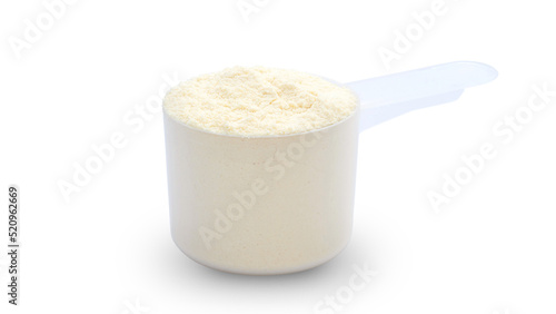A scoop of whey protein powder on a white background. photo