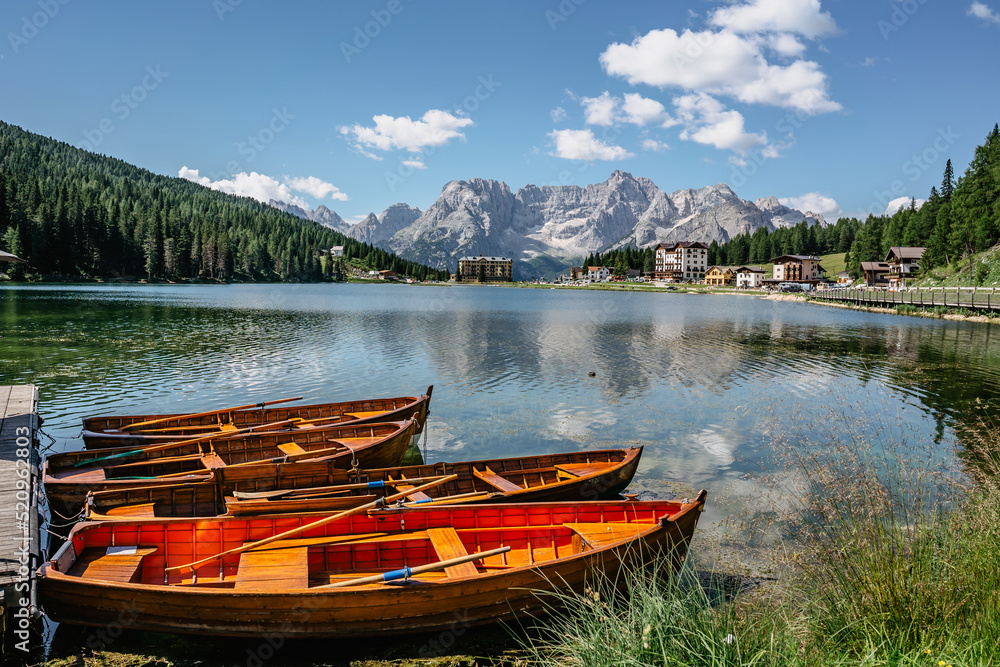 Lake Misurina,Lago di Misurina is pearl of the Dolomites.Mountain lake in Italy with wooden boats,Veneto region,Sorapis mountain group.Perfect destination for hiking.Touristic resort for holiday