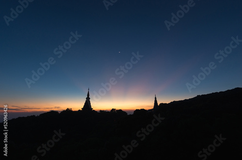 Twilight Moments sunset or sunrise Above the sacred pagoda at Doi Inthanon National Park, Chiang Mai, Thailand. © 24Novembers