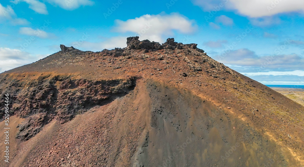 Naklejka premium Saxholl Crater is a famous volcano in Iceland. Aerial view in summer season from drone.