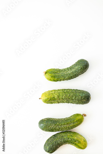 Fresh whole ripe cucumbers as background  closeup