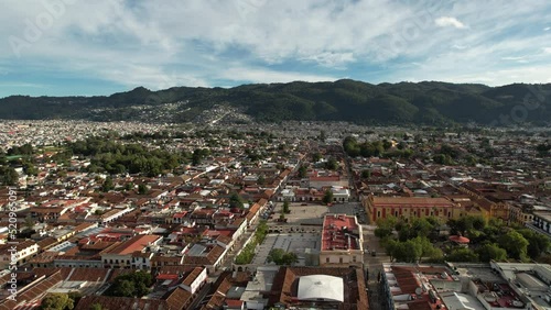 drone shot touring the city of san cristobal de las casas in chiapas mexico in the morning photo