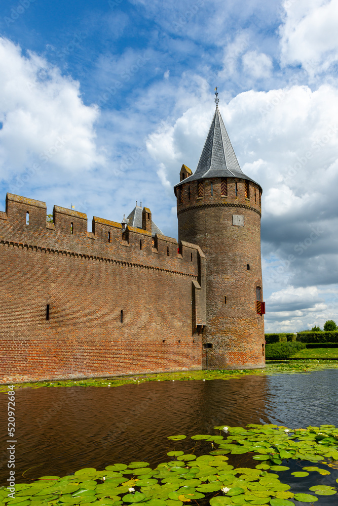 The Muiderslot Castle with moat in Muiden.
