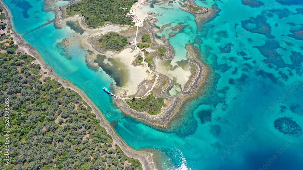 Obraz premium Aerial drone photo of tropical exotic paradise island complex in Mediterranean sea forming a blue lagoon archipelago with crystal clear turquoise sea sandy beaches
