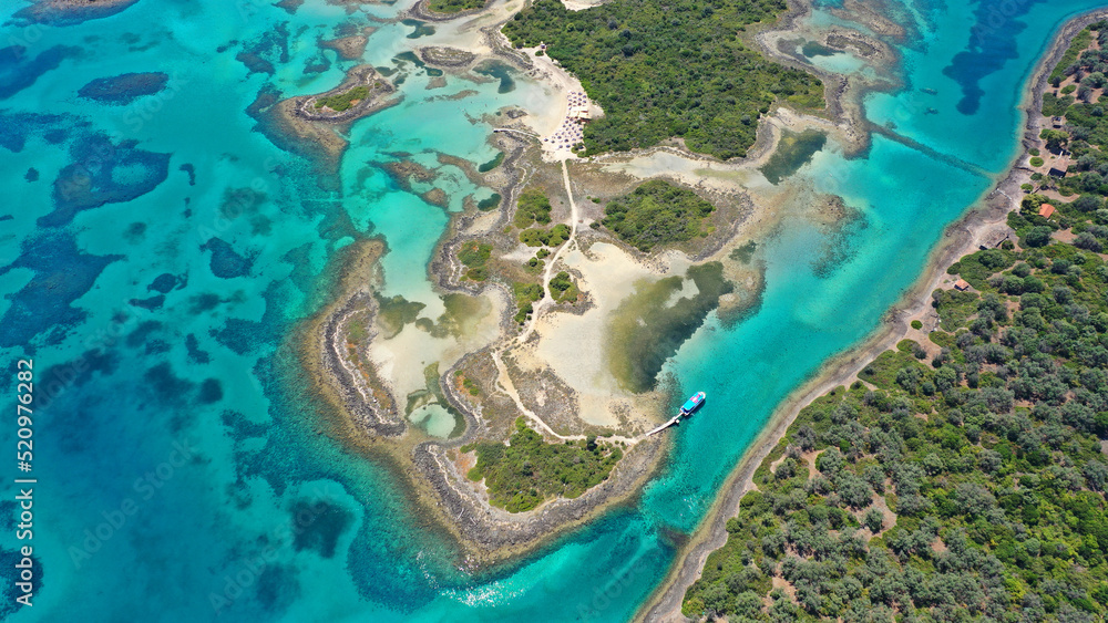 Aerial drone photo of tropical exotic paradise island complex in Mediterranean sea forming a blue lagoon archipelago with crystal clear turquoise sea sandy beaches