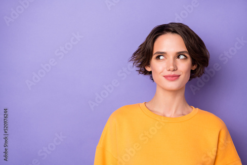 Photo of pretty positive minded person look interested empty space isolated on violet color background