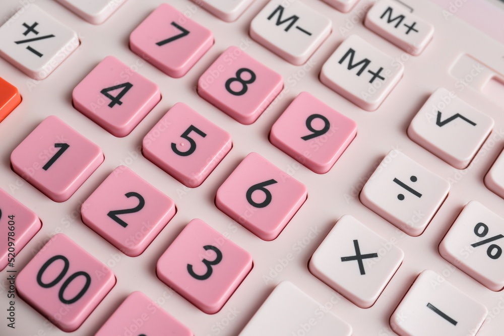 Closeup view of pink calculator as background Closeup view of pink calculator as background