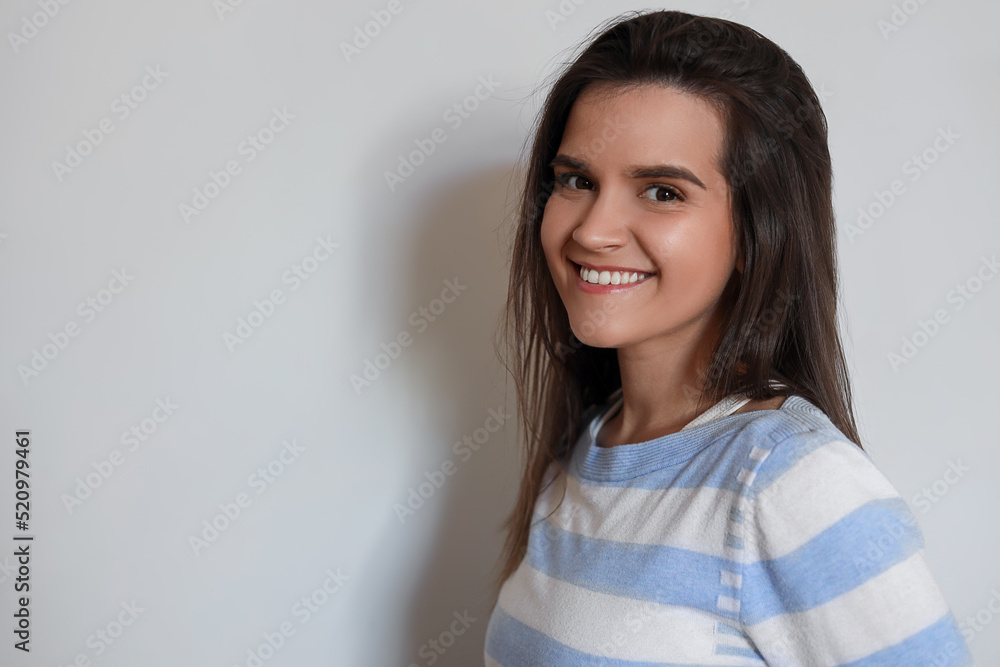 Portrait of beautiful young woman on white background, space for text Portrait of beautiful young woman on white background, space for text