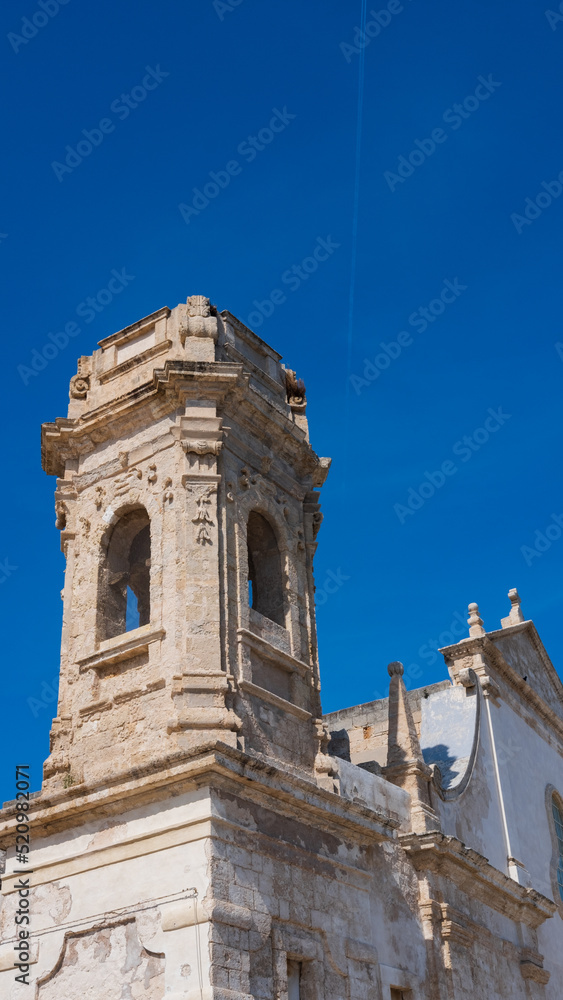 detail ancient church bell tower. Monopoli, Puglia. Italy
