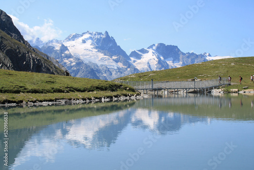 Goleon lake in the french Alps with view on La Meije mountain 